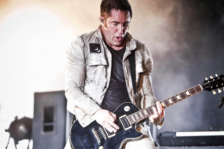 FILE - In this June 27, 2009 file photo, U.S. singer of the band Nine Inch Nails, Trent Reznor, performs during the Music Openair Festival in St. Gallen, Switzerland. (AP Photo/Keystone, Ennio Leanza, file) NYTCREDIT: Ennio Leanza/Keystone, Via Associated Press 16golden